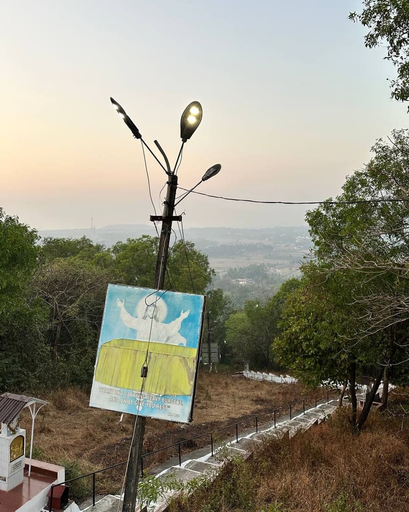 Religious sign on a hillside pilgrimage path